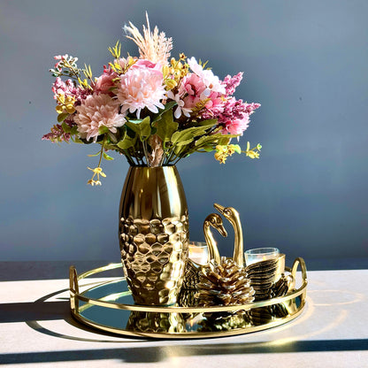 Product image of a Metal Gold Vase from Indian Impressions, featuring a sleek and modern design with a polished gold finish. Perfect as a standalone décor piece or for displaying flowers, this vase adds elegance and sophistication to any space. Ideal for Vastu, home décor, or gifting.