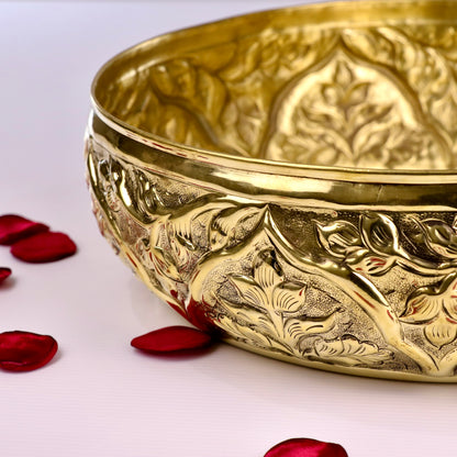 Product image of a Brass Gulmohar Urli from Indian Impressions, featuring a beautifully crafted design with intricate floral detailing. The urli has a polished brass finish, ideal for adding a touch of elegance to home décor, spiritual rituals, or gifting, and is perfect for enhancing the ambiance of any space.