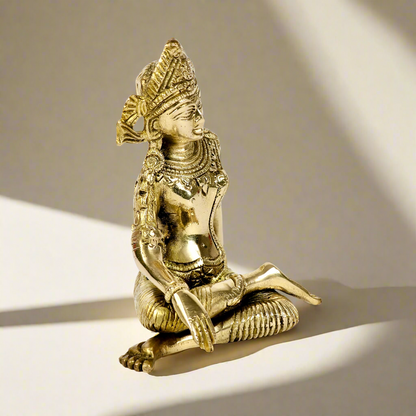 Product image of a Brass Indra Dev Idol from Indian Impressions, showcasing Lord Indra seated on his throne, holding traditional symbols. The idol is intricately crafted with fine details and a polished brass finish, making it an ideal piece for spiritual practices, home décor, or gifting to bring divine blessings and prosperity.