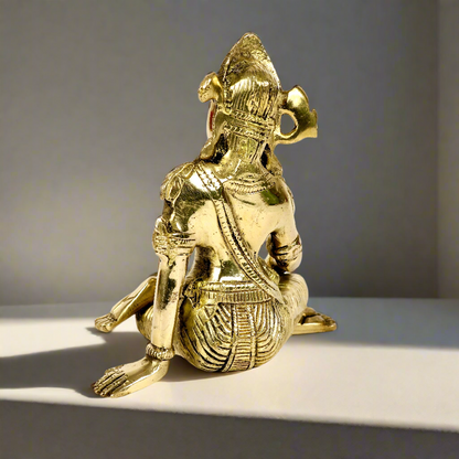 Product image of a Brass Indra Dev Idol from Indian Impressions, showcasing Lord Indra seated on his throne, holding traditional symbols. The idol is intricately crafted with fine details and a polished brass finish, making it an ideal piece for Vastu, spiritual practices, home décor, or gifting to bring divine blessings, prosperity, and positive energy.