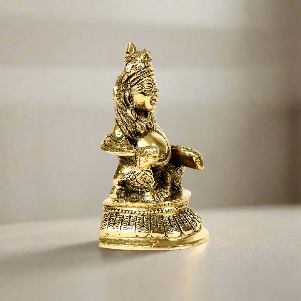 Product image of a Brass Kuber Idol from Indian Impressions, featuring Lord Kuber, the deity of wealth, seated gracefully with a pot of treasures. The idol is intricately crafted with fine details and a polished brass finish, making it perfect for Vastu, spiritual practices, home décor, or gifting to attract prosperity and abundance.