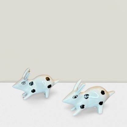 Product image of a Brass Rabbit Pair from Indian Impressions, featuring two intricately crafted rabbits in a sitting posture. Made from polished brass with fine detailing, this pair symbolizes harmony and positivity. Ideal for Vastu, home décor, or gifting, adding a touch of charm and elegance to any space.