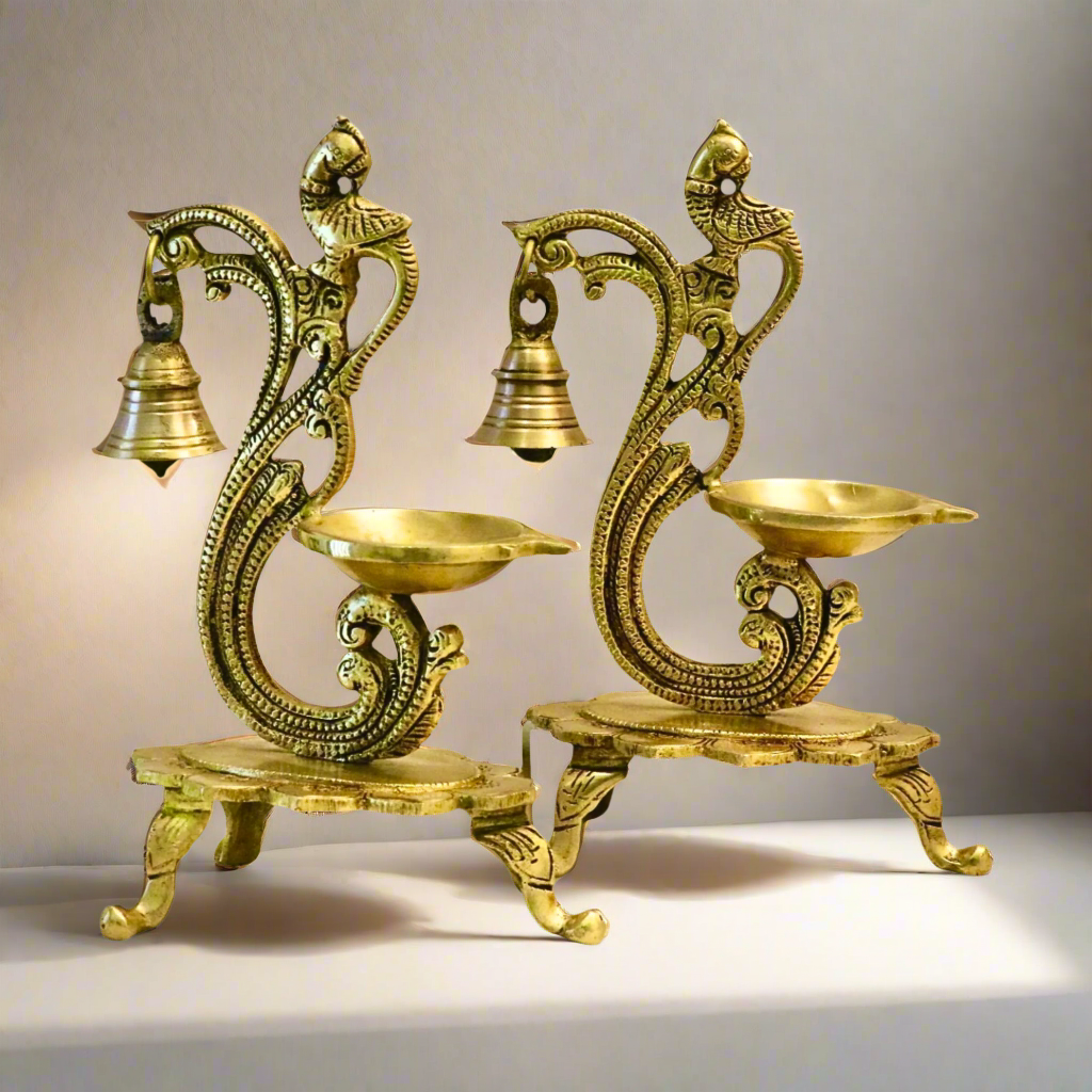 Product image of the Shubh Diya Brass from Indian Impressions, featuring a traditional brass oil lamp with intricate detailing. Crafted to symbolize prosperity and positivity, this diya is perfect for Vastu, spiritual rituals, festive occasions, or gifting, adding a warm and auspicious glow to any space.