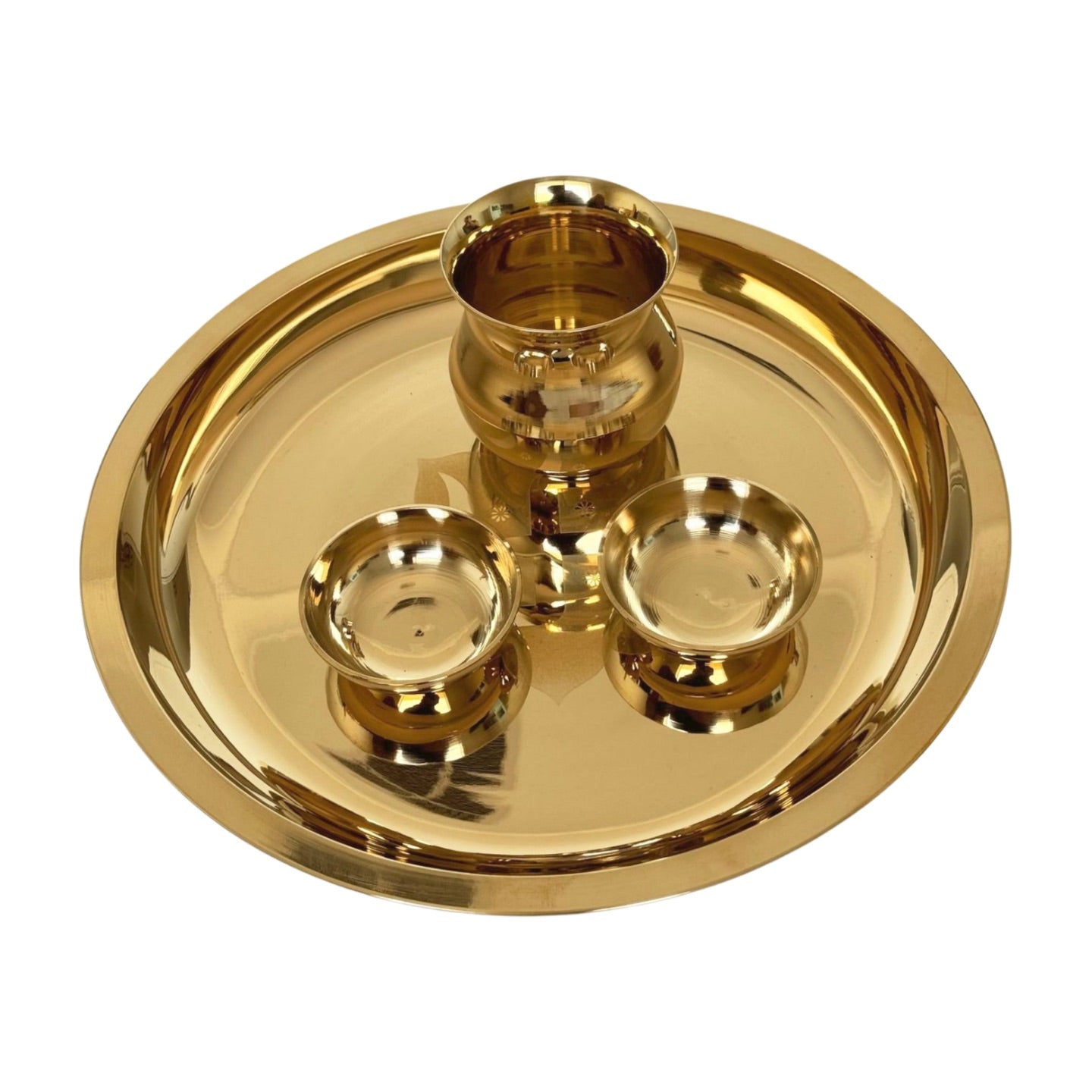 Product image of a Bronze Pooja Thali Set from Indian Impressions, featuring a beautifully handcrafted design. The set includes a thali, diya, incense holder, and small bowls, all crafted from polished bronze. Perfect for Vastu, spiritual rituals, home décor, or gifting, it adds a traditional and elegant touch to any sacred space.