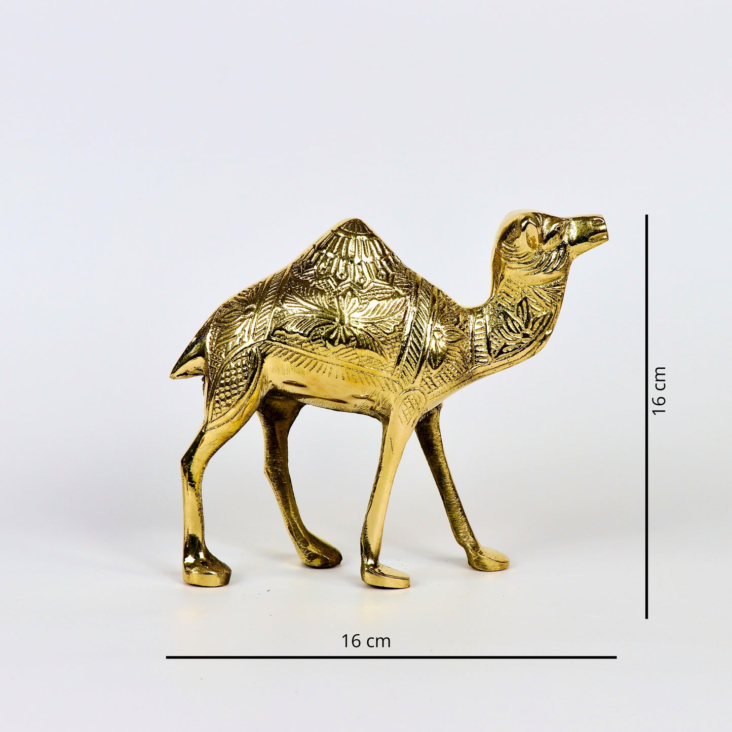 Product image of a Brass Camel figurine from Indian Impressions, intricately crafted with detailed features. The camel is depicted in a standing posture, symbolizing endurance and strength. Finished with a polished brass shine, this decorative piece is ideal for Vastu, home décor, or gifting.