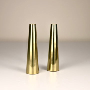 Product image of a Gold Slim Cone Vase Set of 2 from Indian Impressions, featuring sleek, modern designs with a polished gold finish. These vases are ideal for displaying flowers or as standalone decorative pieces. Perfect for enhancing Vastu energy, home décor, or gifting, adding elegance and sophistication to any space.