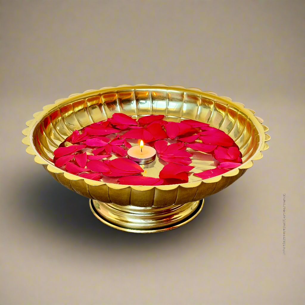 Product image of the Lotus Urli Gold from Indian Impressions, featuring a stunning lotus-inspired design with intricate detailing. Crafted with a polished gold finish, this urli is perfect for Vastu, home décor, festive decorations, or gifting, bringing elegance and positive energy to any space.