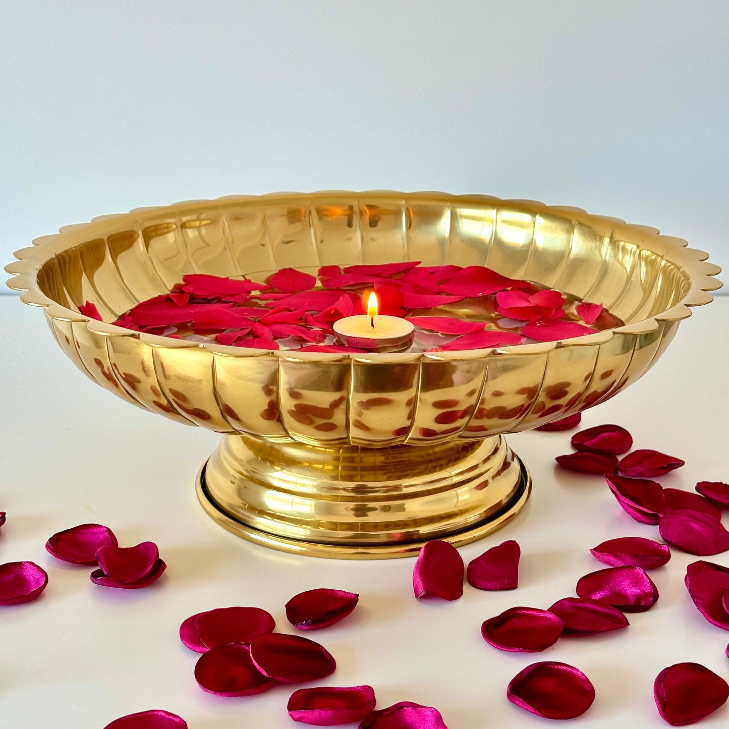 Product image of the Lotus Urli Gold from Indian Impressions, featuring a stunning lotus-inspired design with intricate detailing. Crafted with a polished gold finish, this urli is perfect for Vastu, home décor, festive decorations, or gifting, bringing elegance and positive energy to any space.