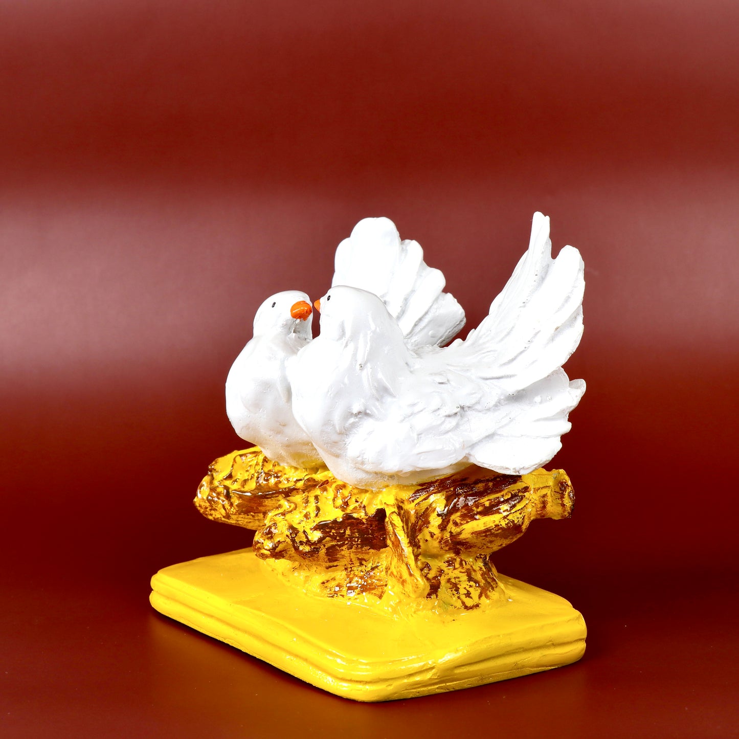 Product image of the Love Birds Pair from Indian Impressions, featuring two intricately crafted brass birds in a loving posture. The polished brass finish adds elegance, making it perfect for Vastu, home décor, or gifting to symbolize love, harmony, and positivity in any space.