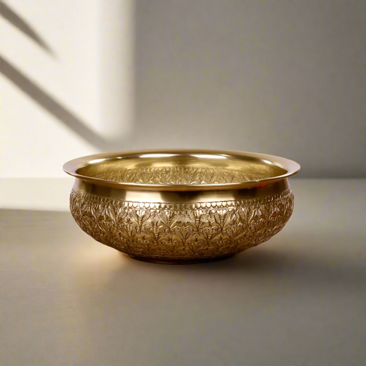 Product image of the Modini Chitai Urli Gold from Indian Impressions, featuring an intricately handcrafted design with detailed patterns. Crafted from polished gold-tone material, this urli is ideal for Vastu, home décor, festive decorations, or gifting, adding an aura of elegance and positivity to any space.