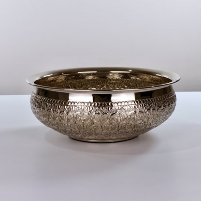 Product image of the Modini Chitai Urli Silver from Indian Impressions, showcasing an intricately handcrafted design with detailed patterns. Made with a polished silver-tone finish, this urli is perfect for Vastu, home décor, festive decorations, or gifting, bringing elegance and positive energy to any space.