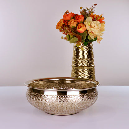 Product image of the Modini Chitai Urli Silver from Indian Impressions, showcasing an intricately handcrafted design with detailed patterns. Made with a polished silver-tone finish, this urli is perfect for Vastu, home décor, festive decorations, or gifting, bringing elegance and positive energy to any space.