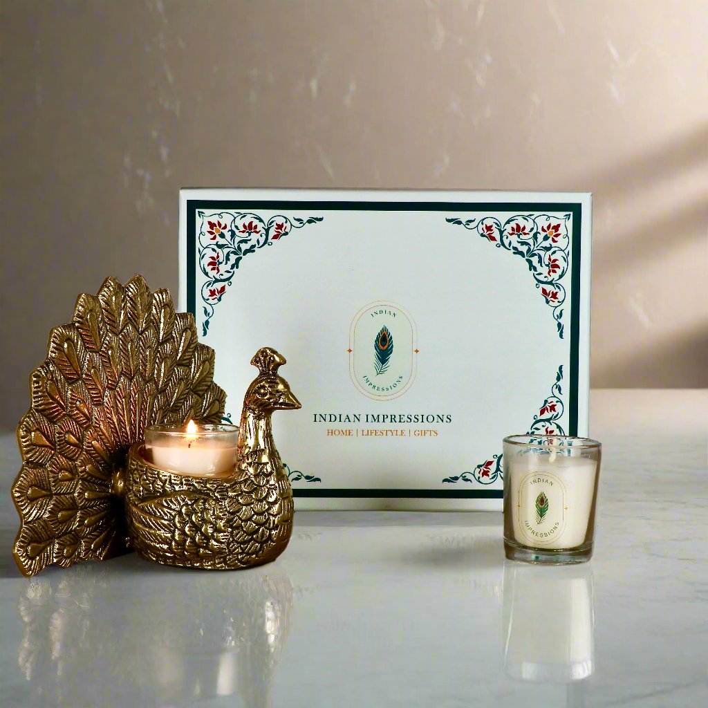 Product image of the Peacock Candle Holder with Antique Brass Finish from Indian Impressions, showcasing a stunning peacock design with intricate detailing and a vintage-inspired finish. Ideal for holding candles, this piece is perfect for Vastu, home décor, festive occasions, or gifting, adding elegance and positive energy to any space.