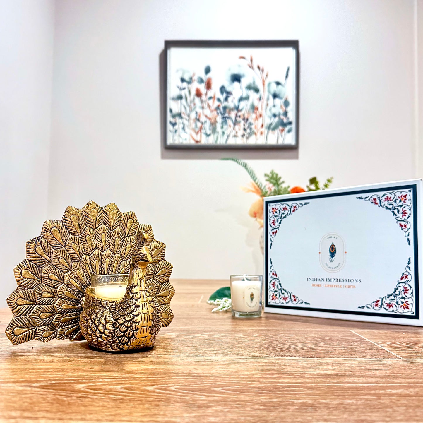 Product image of the Peacock Candle Holder with Antique Brass Finish from Indian Impressions, showcasing a stunning peacock design with intricate detailing and a vintage-inspired finish. Ideal for holding candles, this piece is perfect for Vastu, home décor, festive occasions, or gifting, adding elegance and positive energy to any space.