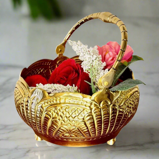 Product image of a Puspam Brass Flower Basket from Indian Impressions, featuring an intricately handcrafted design with traditional motifs. Made from polished brass, this elegant basket is perfect for holding flowers, enhancing Vastu energy, festive décor, or gifting, adding a touch of charm and positivity to any space.