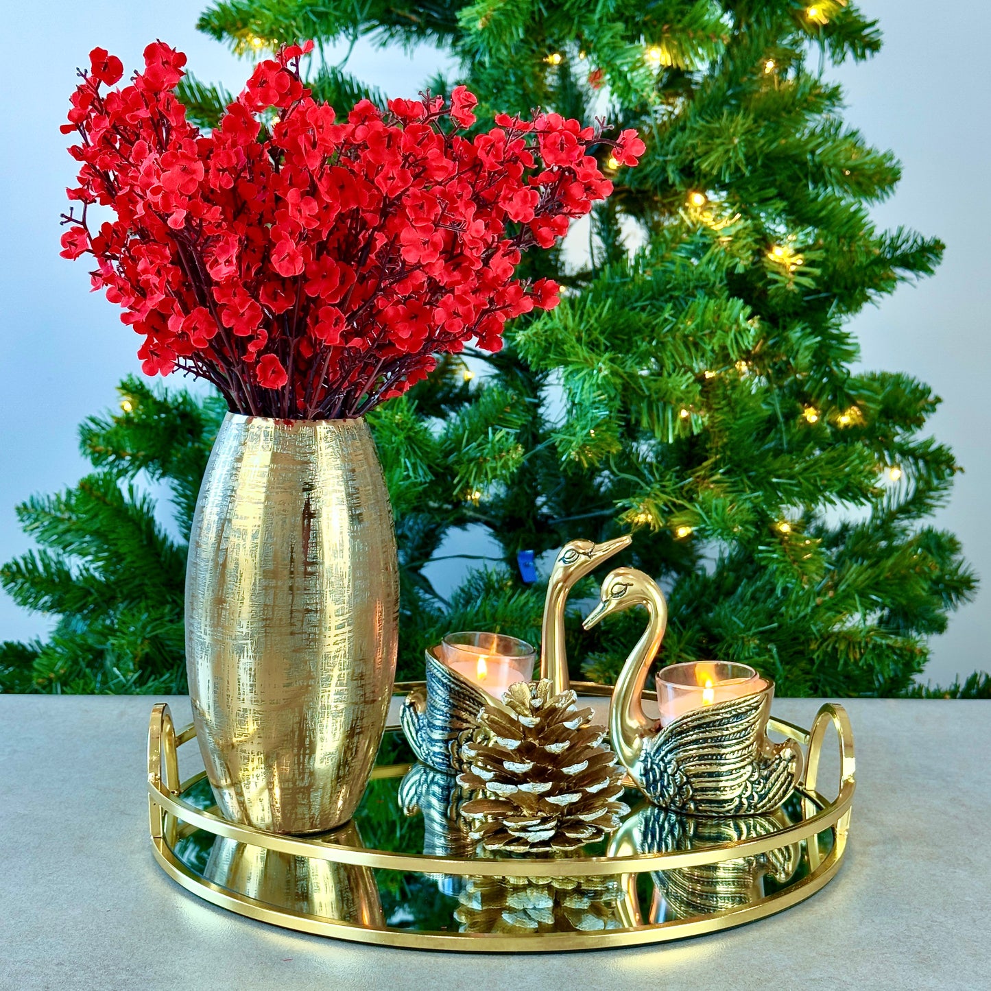 Product image of a Metal Gold Vase from Indian Impressions, featuring a sleek and modern design with a polished gold finish. Perfect as a standalone décor piece or for displaying flowers, this vase adds elegance and sophistication to any space. Ideal for Vastu, home décor, or gifting.