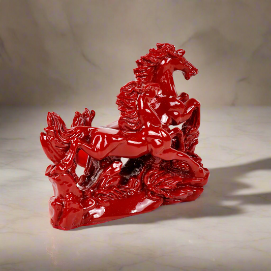 Product image of the Red Horses Pair from Indian Impressions, featuring two beautifully crafted horse figurines in vibrant red with intricate detailing. Symbolizing power, success, and energy, this pair is ideal for Vastu, home décor, or gifting, bringing a dynamic and elegant touch to any space.