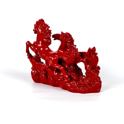 Product image of the Red Horses Pair from Indian Impressions, featuring two beautifully crafted horse figurines in vibrant red with intricate detailing. Symbolizing power, success, and energy, this pair is ideal for Vastu, home décor, or gifting, bringing a dynamic and elegant touch to any space.