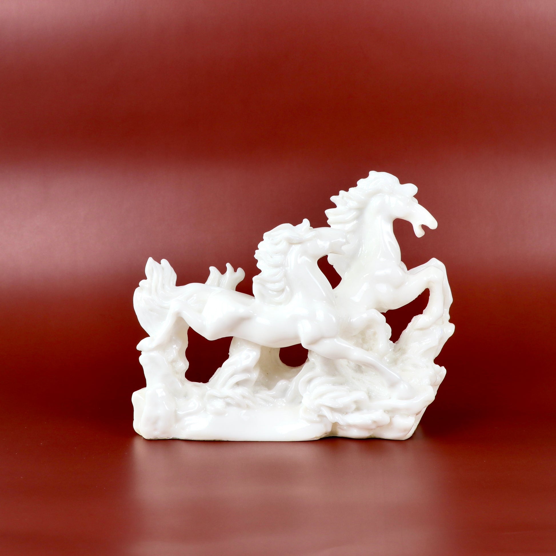 Product image of the Vastu Two White Horses from Indian Impressions, featuring two beautifully crafted white horse figurines symbolizing power, success, and positive energy. Perfect for Vastu corrections, home décor, or gifting, these horses add elegance and harmony to any space, bringing good fortune and strength.